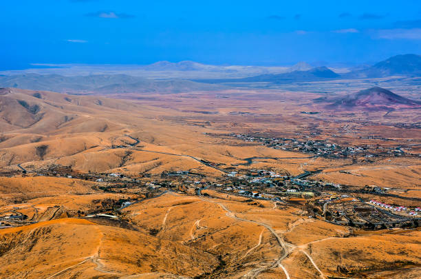 istock A desert landscape with a small town in the distance 2172232612