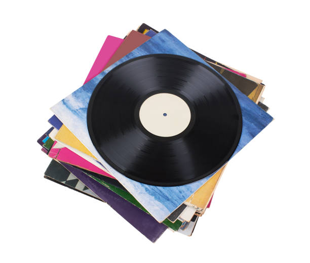 istock Vinyl record on a stack paper envelopes. Analog sound. Classic audio. Isolated on white 2172233897