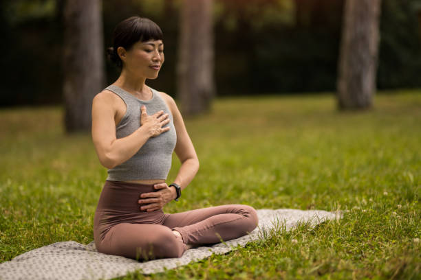 Woman doing yoga in nature.