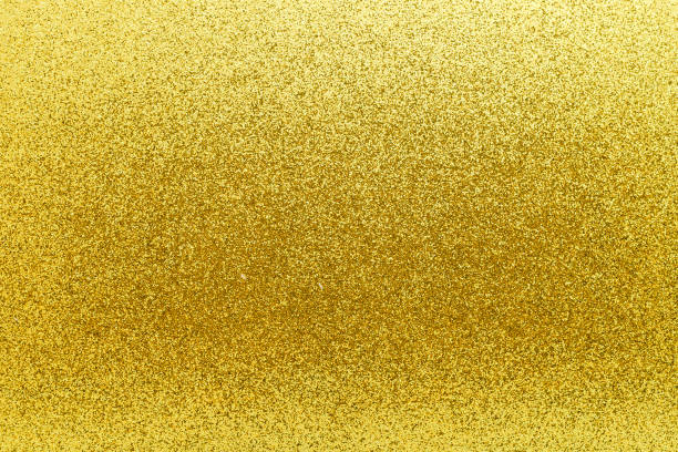 istock A beautiful golden texture with a shimmering effect, perfect for backgrounds, designs, and festive occasions. 2172251557
