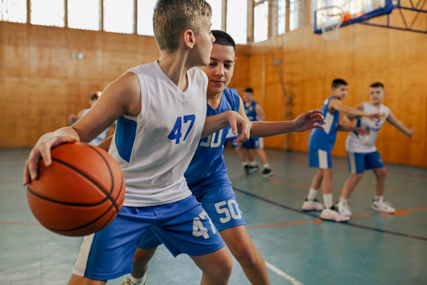 istock Basketball game with players in blue 2172254060