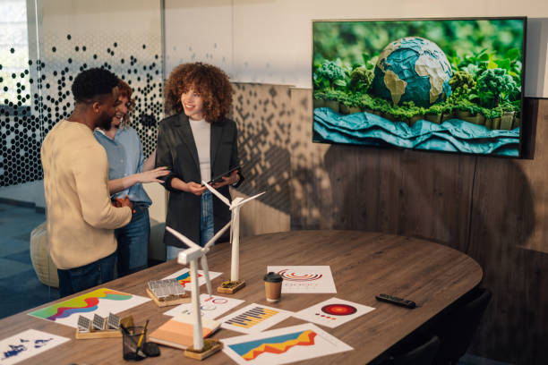 istock Interracial environmentalists discussing renewable energy technology. 2172254116