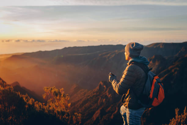 istock Hiker greeting the sun on Madeira island. 2172255400