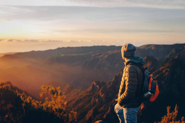 istock Hiker greeting the sun on Madeira island. 2172255403