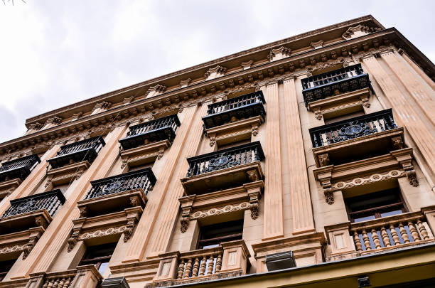 istock A large building with balconies and a cloudy sky in the background 2172256393