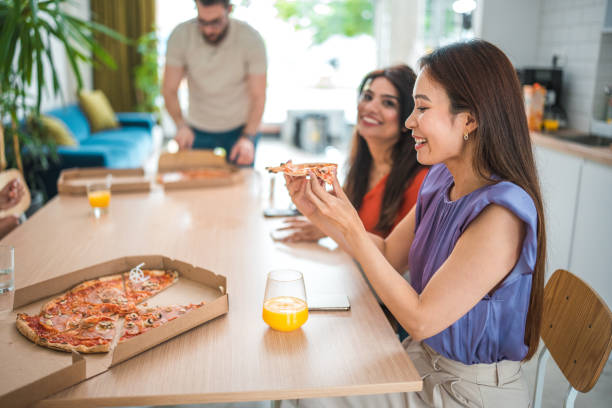 istock Casual Work Break with Pizza and Diverse Team 2172256864