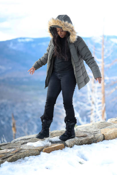 istock Woman standing on mountain range. 2172258235