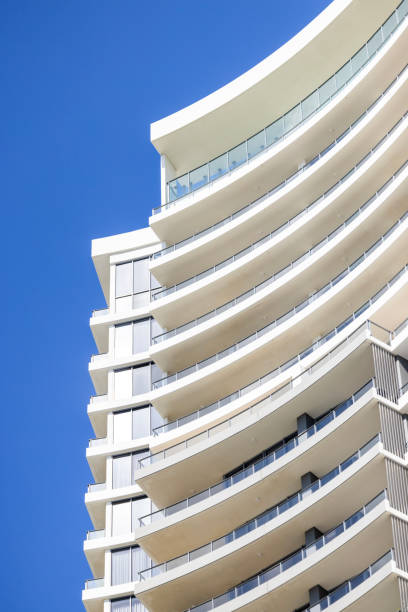 istock Modern apartment building against blue sky, background with copy space 2172259118