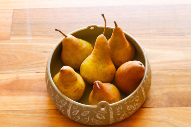 Six Organic Pears in a bowl