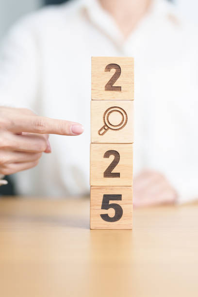 istock 2025 block with magnifying glass icon. SEO, Search Engine Optimization, hiring , Advertising, Idea, Strategy, marketing, Keyword, Content and New Year start concepts 2172276449