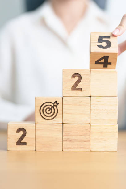 istock 2024 year change to 2025 year block with dartboard icon. Goal, Target, Resolution, strategy, plan, Action, mission, motivation, and New Year start concepts 2172276498