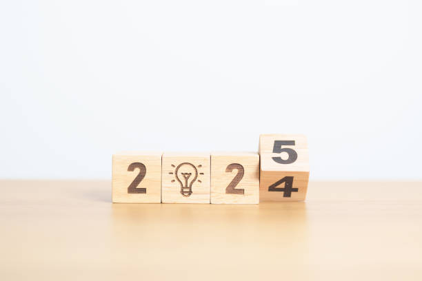 istock 2024 year change to 2025 year block with lightbulb. Business Idea, Creative, Thinking, brainstorm, Goal, Resolution, strategy, plan, Action, change and New Year start concepts 2172277308
