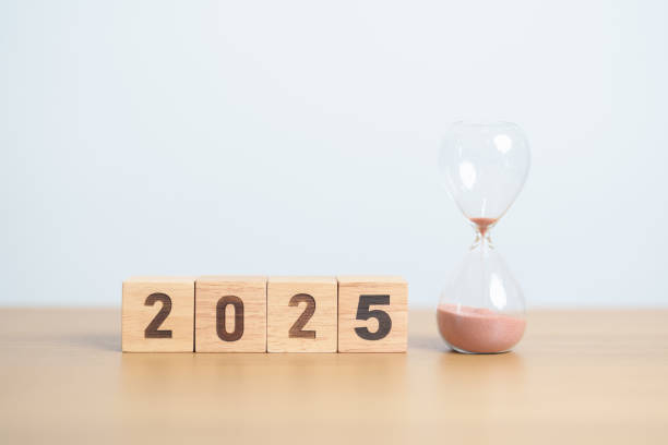 istock Happy New Year 2025 with hourglass on table. Resolution, time, plan, goal, motivation, reboot, countdown and New Year holiday concepts 2172277359