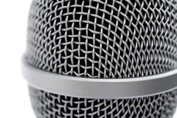 microphone dynamic for drums, standing in front of a speaker , abstract music background , professional audio