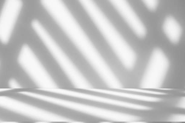 istock Studio style background wall decoration presentation uses white tones. with shadows cast from a nearby window, concept creating a decorative backdrop. 2172279366