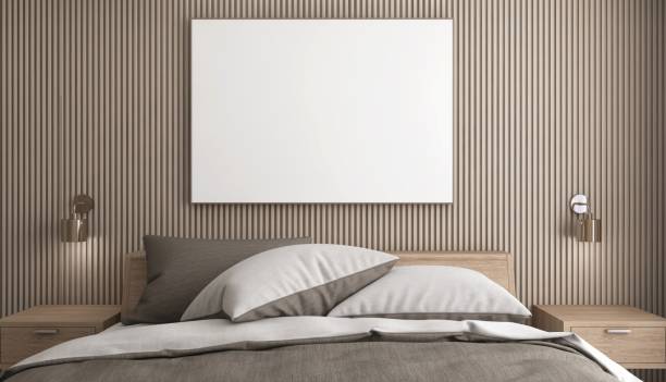 istock Blank large white poster frame on beige wood panel wall in luxury, modern, formal bedroom with brown wooden bed in sunlight for photo, art, mural, painting template background 3D 2172280075