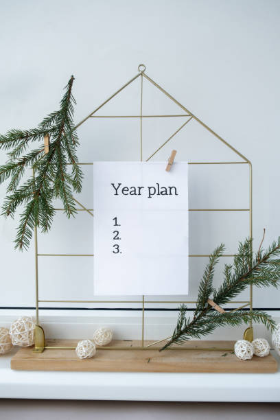 istock Action board YEAR PLAN new year's resolutions on colorful sticky notes. Making promises for new year, setting goals. Dream year 2172283828