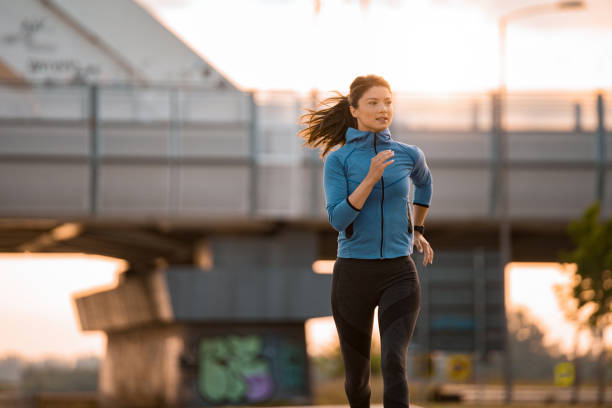 istock Athletic woman running outdoors in the morning. 2172285914