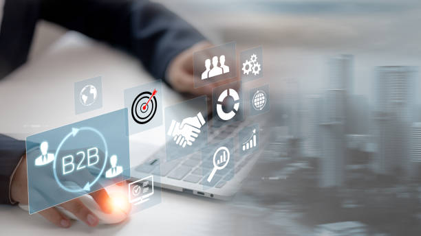 istock B2B business strategy concept. Businessman working with B2B virtual on laptop, conceptualizing strategy, partnership, targets in business to business services. E-commerce, B2B Marketing, enterprise, 2172287752