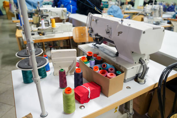 istock Thread and sewing machine in textile factory without people 2172289883
