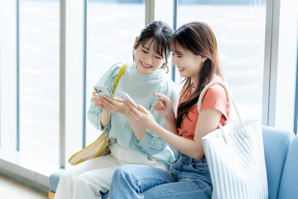 istock Young woman operating a smartphone 2172291850
