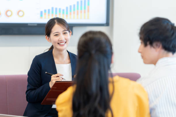 istock young woman at the reception 2172292104