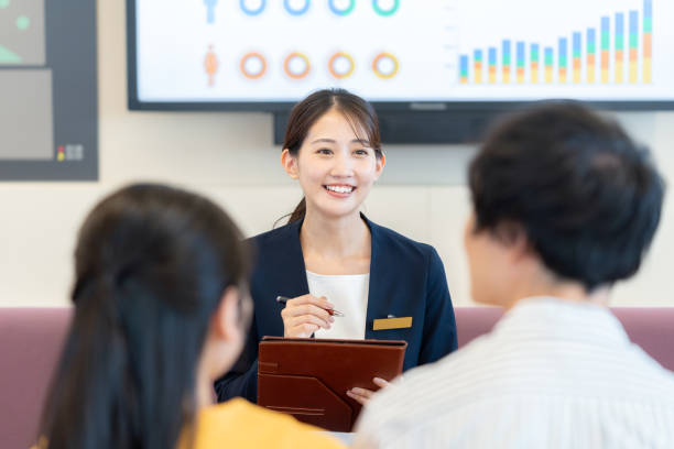 istock young woman at the reception 2172292114