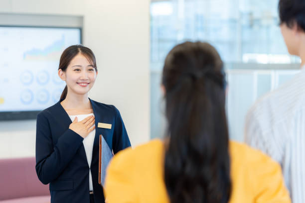 istock young woman at the reception 2172292126