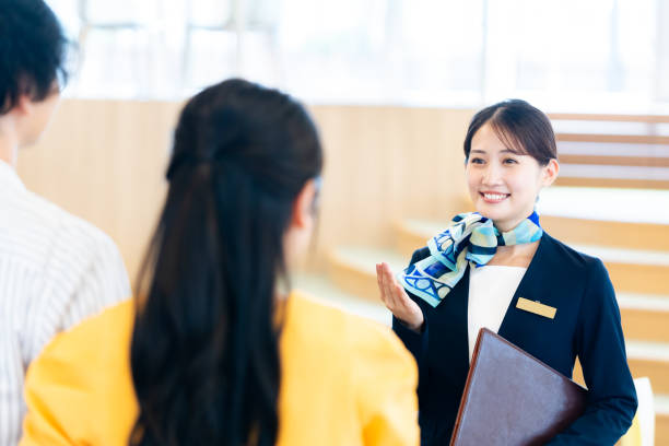 istock young woman at the reception 2172292129