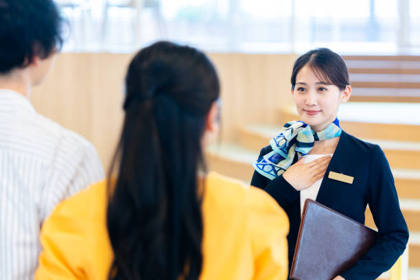 istock young woman at the reception 2172292131