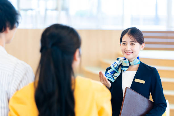 istock young woman at the reception 2172292132