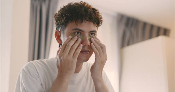 istock Man Applying Eye Patches for Skincare. 2172294019