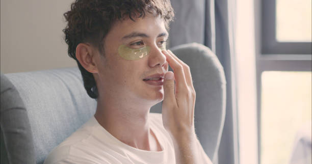 istock Man Applying Eye Patches for Skincare. 2172294024