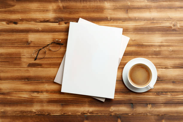istock A Blank Notepad Resting on a Wooden Table in Natural Light During Daytime 2172304234
