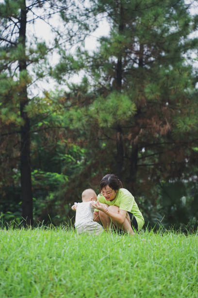istock Young Asian mother play with her son 2172304292