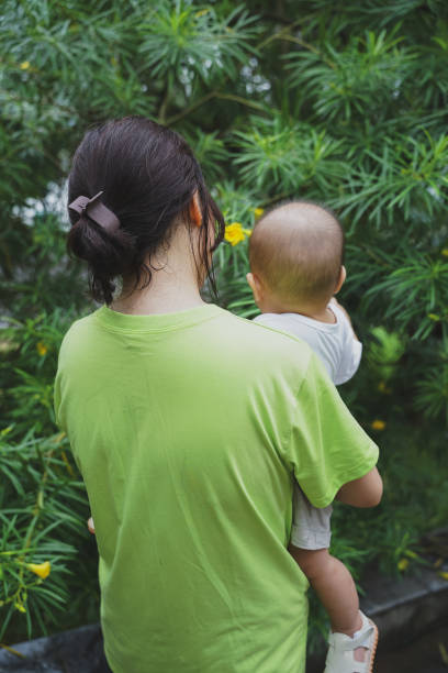 istock Young Asian mother play with her son 2172304369
