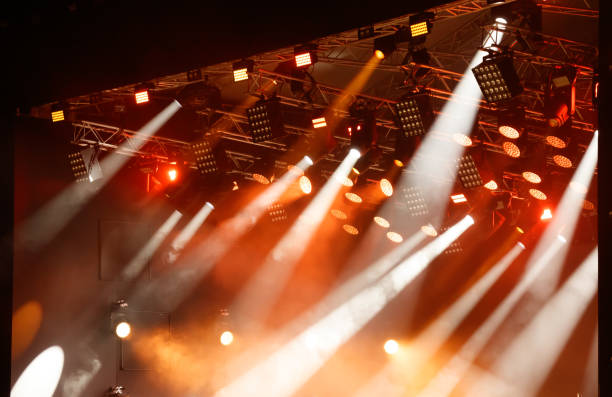 istock Red-orange color on stage at a concert 2172305520