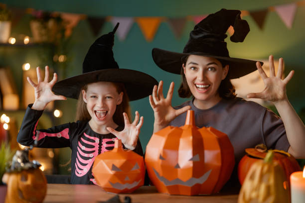 istock Happy family preparing for Halloween. 2172308850