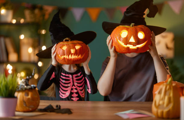 istock Happy family preparing for Halloween. 2172308976