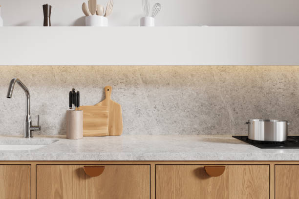 istock Modern home kitchen interior with sink, quartz counter and gas stove 2172313459