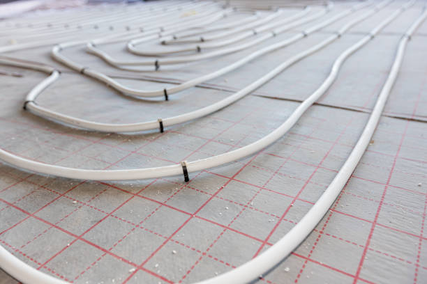 istock Pipe system of floor heating mounted in residential building under construction 2172313584