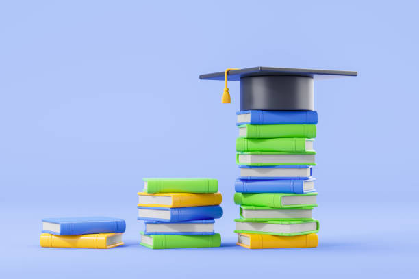 istock Stacks of books with graduation cap on blue background. 3D Rendering 2172313793
