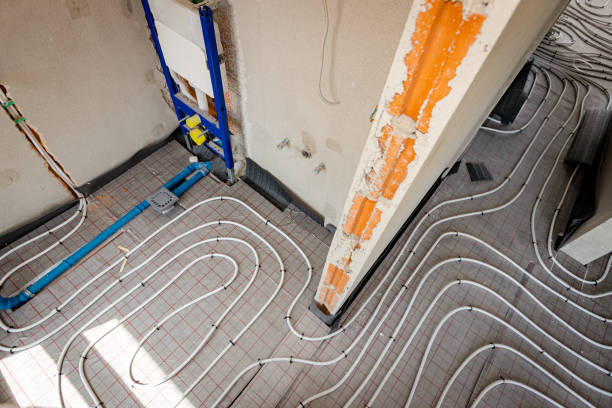 istock Pipe system of floor heating mounted in unfinished washroom 2172313896