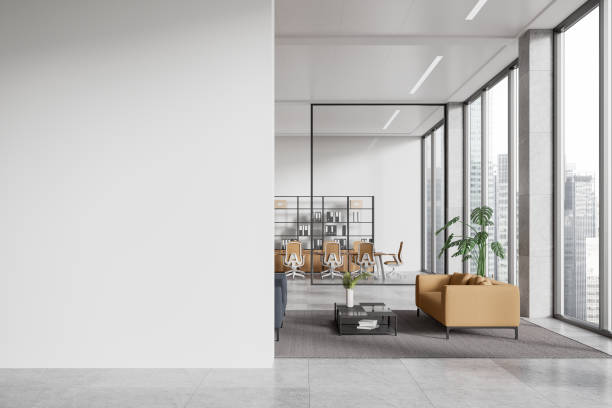 istock White office interior with waiting and meeting room, window. Mockup wall 2172314226