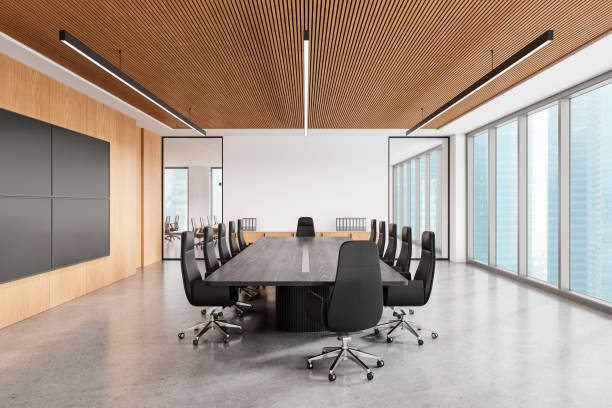 istock Wooden conference interior with table and chairs, tv screen and panoramic window 2172314338