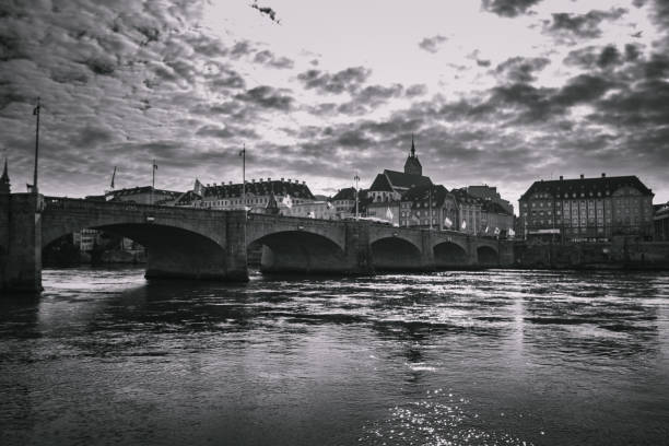 istock Low angle view of Basel old town and its stone bridge on a overcast day 2172315607
