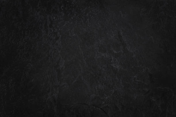 istock Dark grey black slate texture in natural pattern with high resolution for background and design art work. Black stone wall. 2172315713