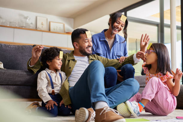 istock Mixed race family playing together at home 2172316534