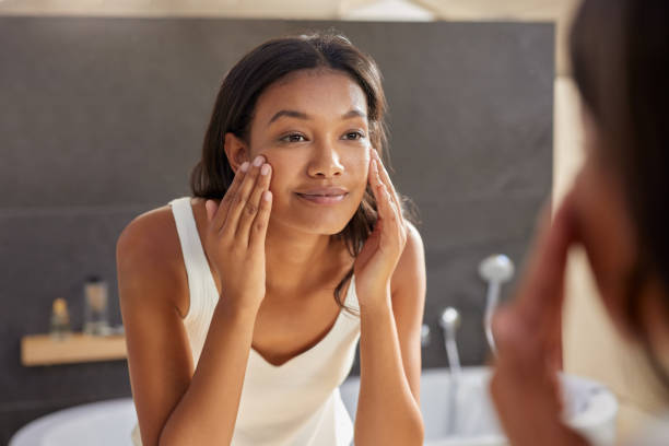 istock Multiethnic woman during skin care routine 2172318417