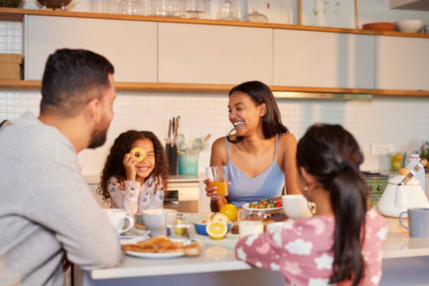 istock Family enjoying breakfast with fun and love 2172319350